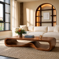Sculptural Solid Wood Coffee Table With Wave Open Base Rounded Waterfall Sides And Natural Wood Grain For Modern Living Room